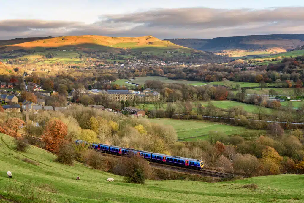How to Travel From London to Manchester Train in the British countryside.